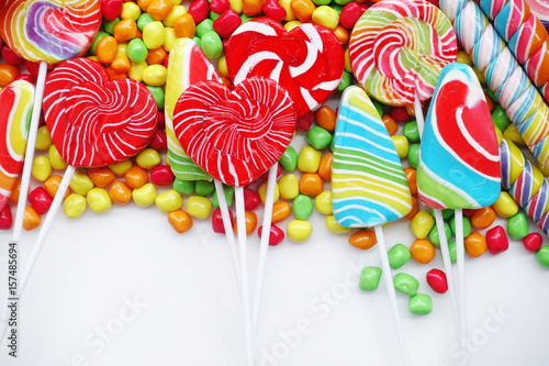 sweets and sugar candies colorful, handmade swirl lollipop for background