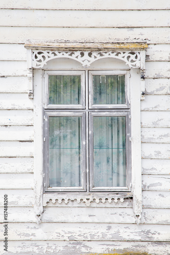 Fototapeta premium Wooden facade with a window in Norway