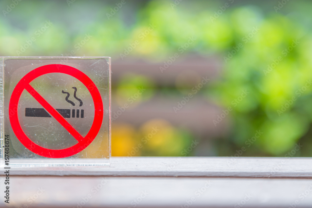 no smoking symbol at outdoor on bokeh nature background no smoking symbol at outdoor on bokeh nature background