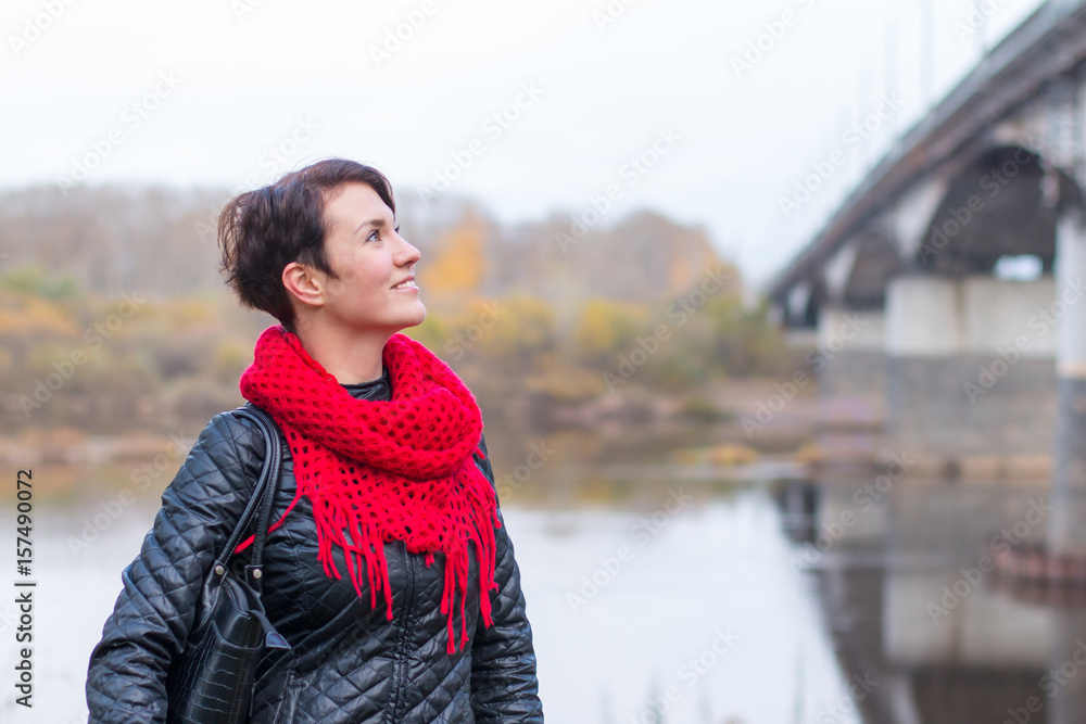 Nice girl in red scarf outdoor