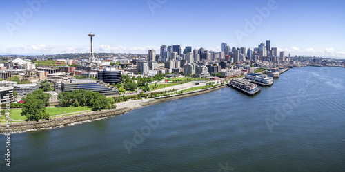 Panoramic_Helicopter_View_of_Seattle_Washington_Waterfront_on_Sunny_Summer_Day_with_Skyline_of_Buidlings