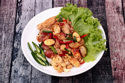 Spicy fried jackfruit seeds and chicken with roasted chile paste.