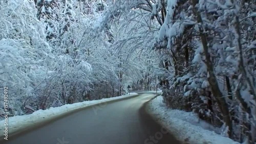 Snowy Drive on a Winding Alpine Road  in High Speed Video II