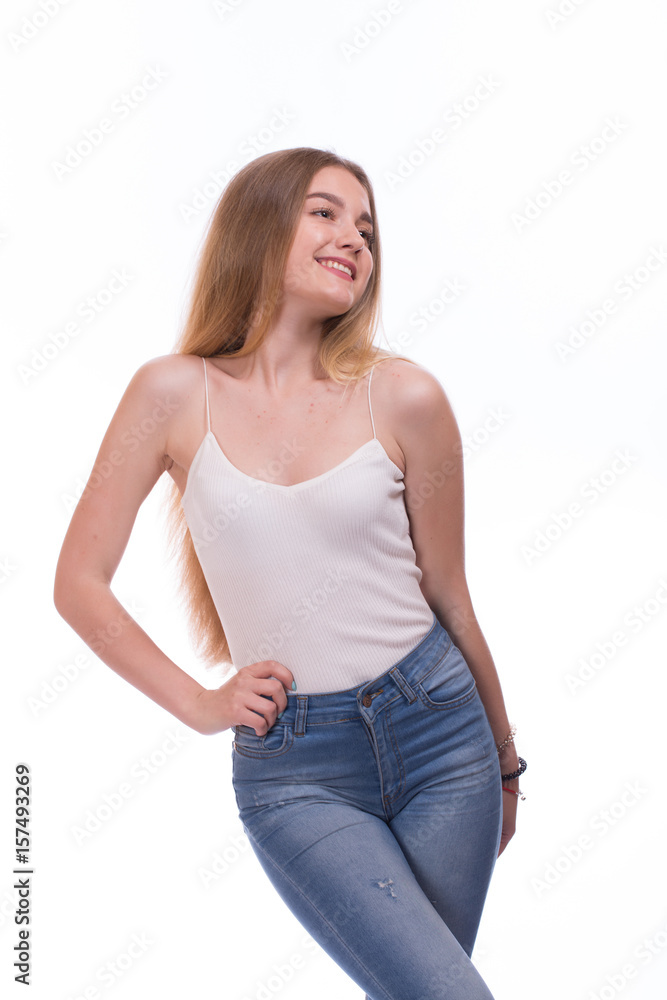 Fototapeta premium Beautiful blonde young woman standing. Isolated on a white background