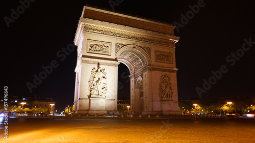 Photography Night photo of iconic Arc de Triomphe in Champs Elysees, Paris, France