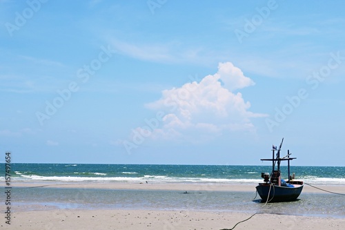 Fishing boat and blue sky ocean view nature landscape coastline 
