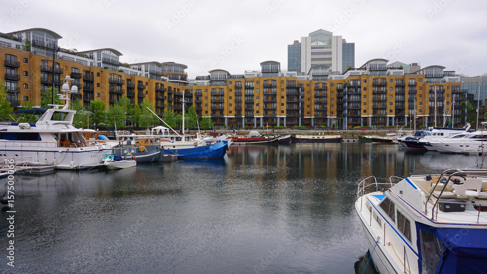 Photo of Saint Katharine's docks near Tower Bridge on a cloudy spring morning, London, United Kingdom