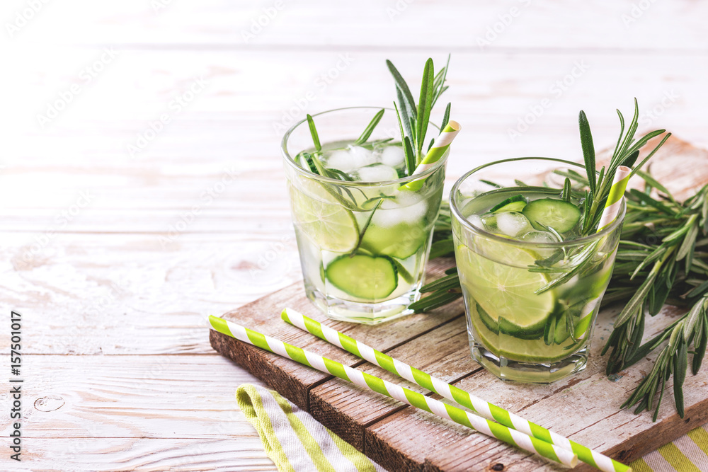 Fototapeta premium rosemary, lime and cucumber lemonade. Copyspace, horizontal view