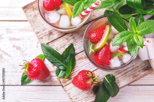 Lemonade with fresh strawberry, mint, lime and jam