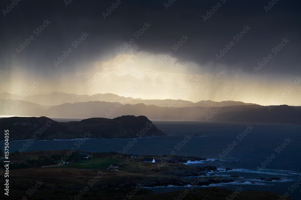 Heavy rain over coastal crofts at Loch Ewe, Scottish Highlands, Scotland, UK. Heavy rain over coastal crofts at Loch Ewe, Scottish Highlands, Scotland, UK.