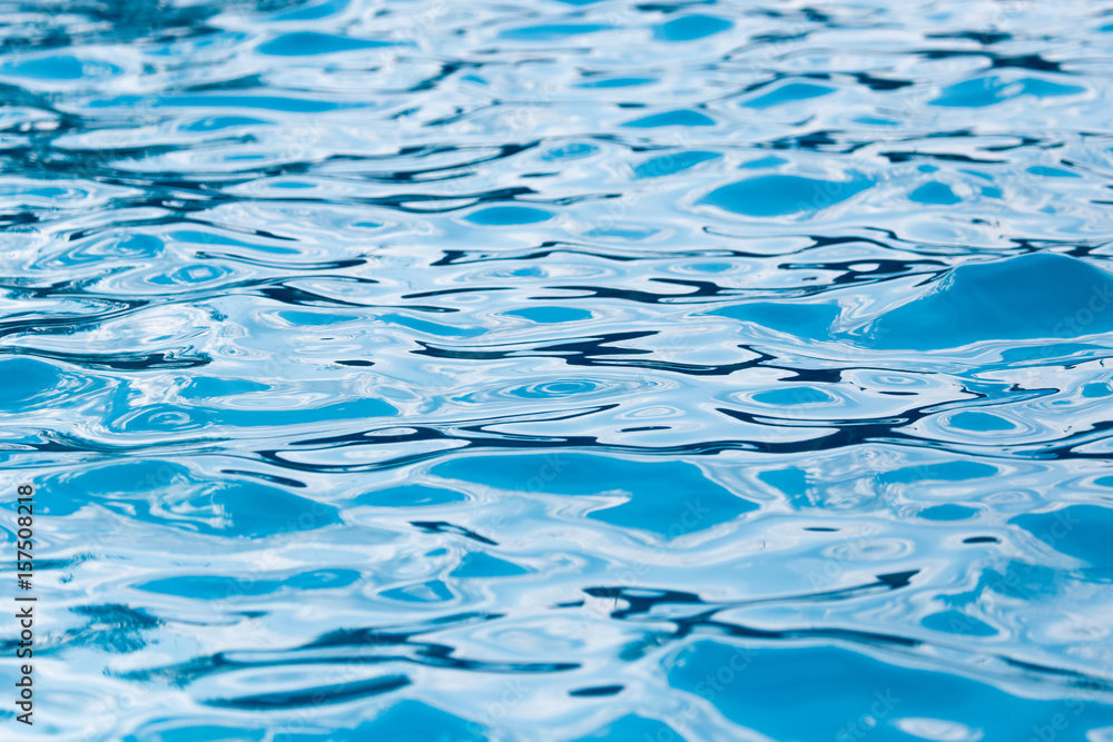 The smooth water in the pool as a background The smooth water in the pool as a background