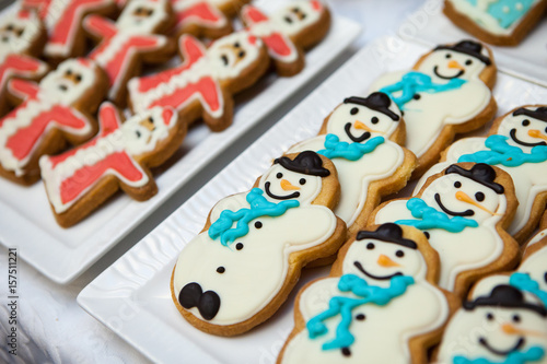 Gingerbread and cookies in the shape of a snowman and Santa Claus