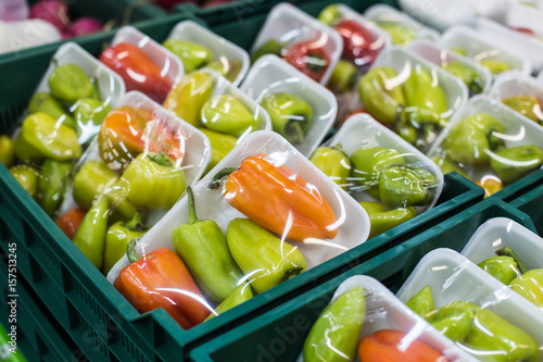 Bulgarian pepper in a box on a shelf in a supermarket