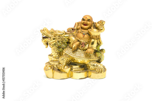 Happy Buddha - Chinese God of Happiness sit on dragon and tortoise shell on white background.