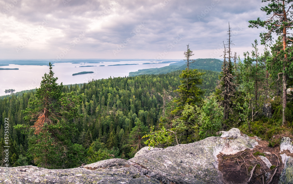 Fototapeta premium Scenic landscape with lake and sunset at evening in Koli, national park.