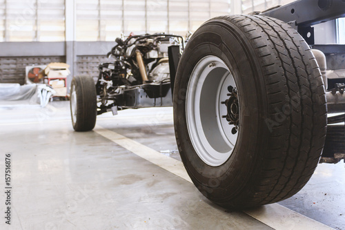 closeup car chassis with engine. soft-focus and over light in the background