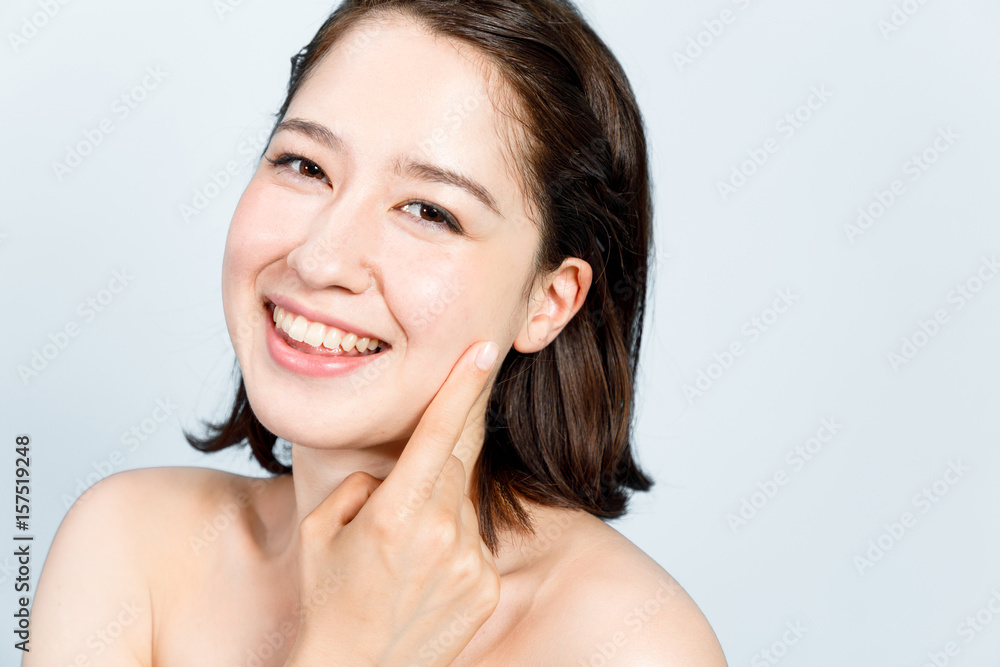 beauty girl of half caucasian and half asian. beauty and cosmetics concept. beauty girl of half caucasian and half asian. beauty and cosmetics concept.