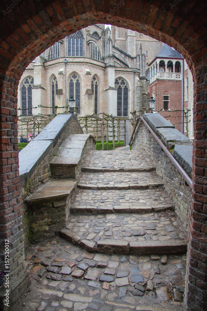 Stone stairway to the Grand Gothic style church in Bruges (Brugge), Belgium