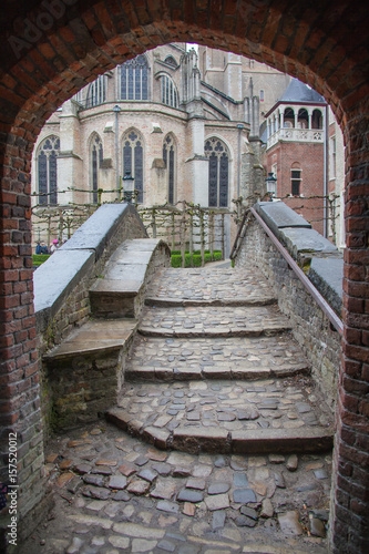 Stone stairway to the Grand Gothic style church in Bruges  Brugge   Belgium