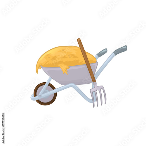 Wheelbarrow with hay and a pitchfork