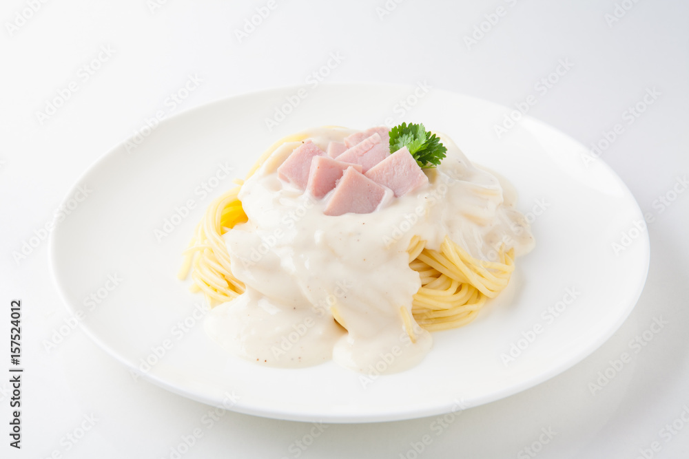 Spaghetti Carbonara with sauce on white plate Spaghetti Carbonara with sauce on white plate