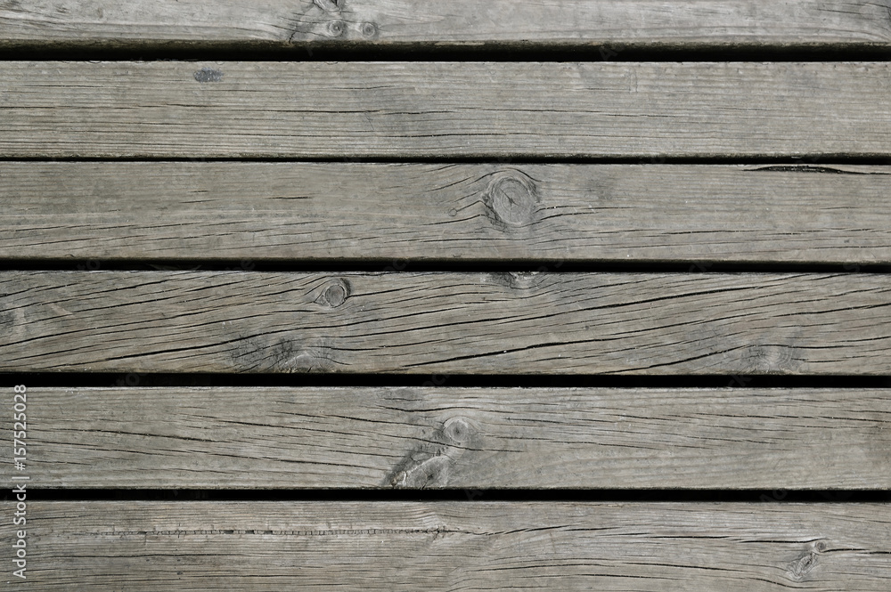 Fototapeta premium Old dark grey wooden fence background texture