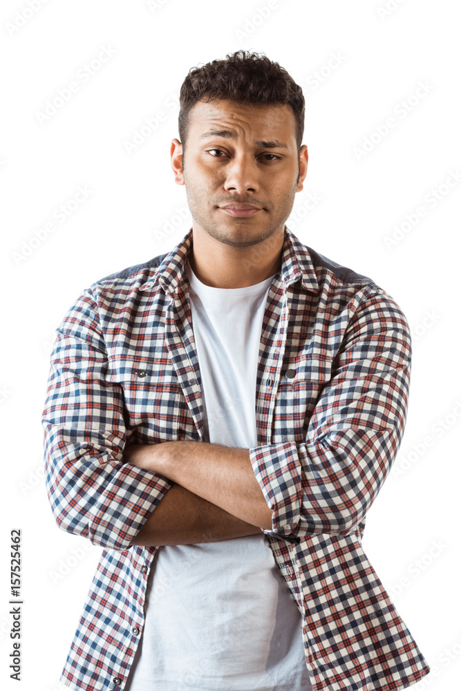 portrait of skeptic man with arms crossed looking at camera isolated on white portrait of skeptic man with arms crossed looking at camera isolated on white