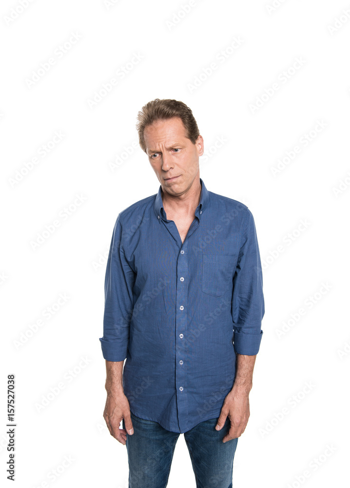 upset lonely middle aged man in casual clothes standing isolated on white upset lonely middle aged man in casual clothes standing isolated on white
