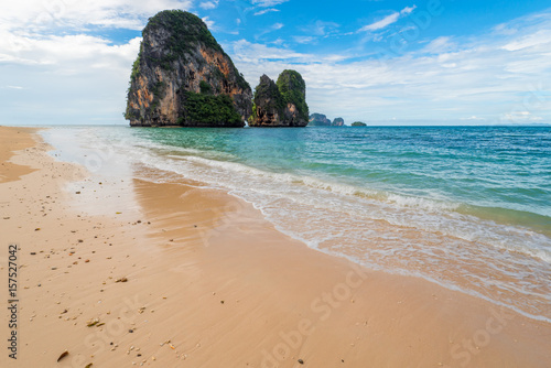 Waves on the shores of the Andaman Sea and a view of the rock