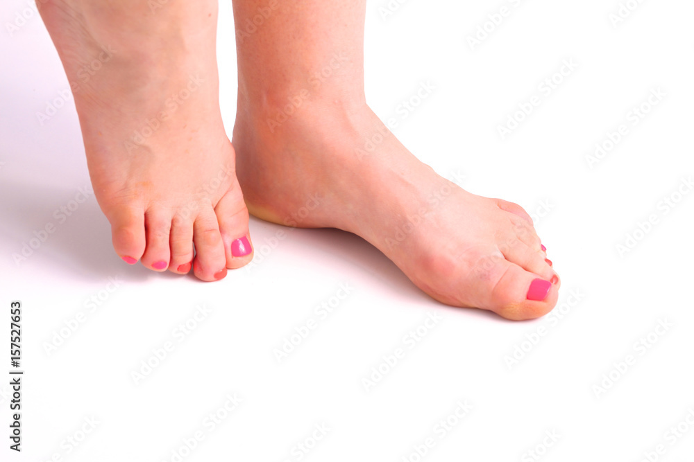 Closeup photo of a beautiful female feet with pedicure