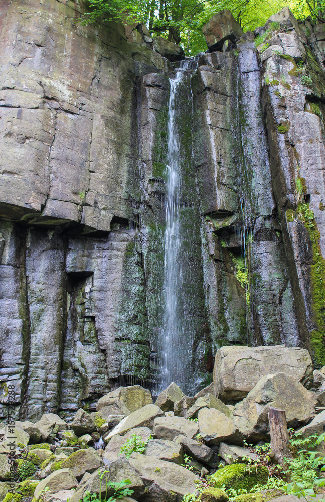 Waterfall with stone near city Vanov. Czech landscape Waterfall with stone near city Vanov. Czech landscape