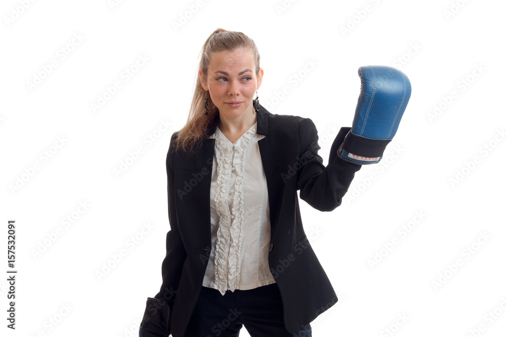 young Office girl in black suit and shirt stretches hand in Boxing Glove young Office girl in black suit and shirt stretches hand in Boxing Glove