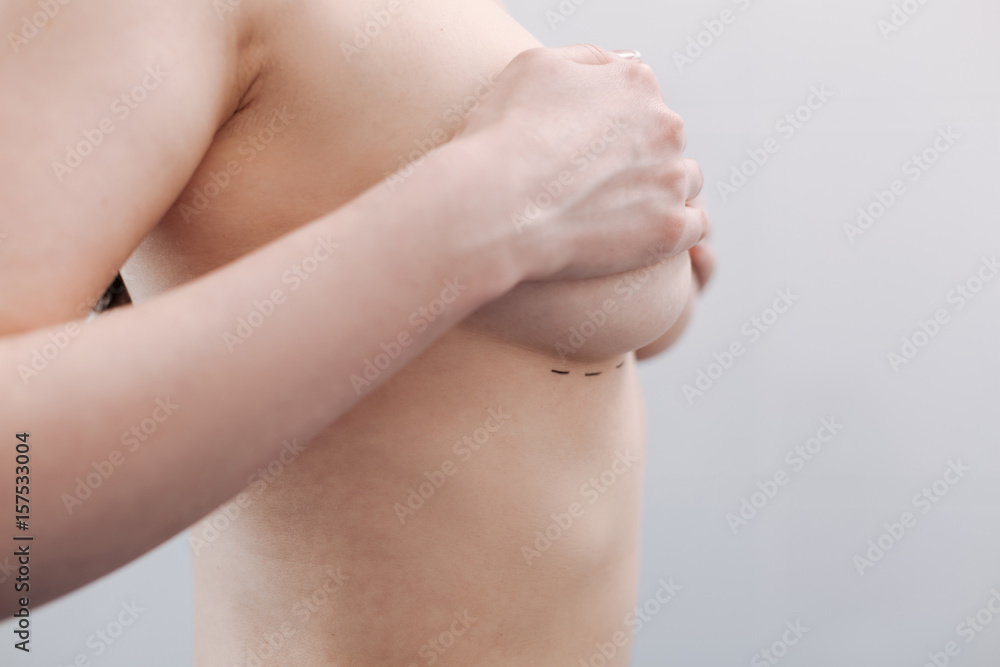 Young slim lady wanting her breast looking nicer Young slim lady wanting her breast looking nicer