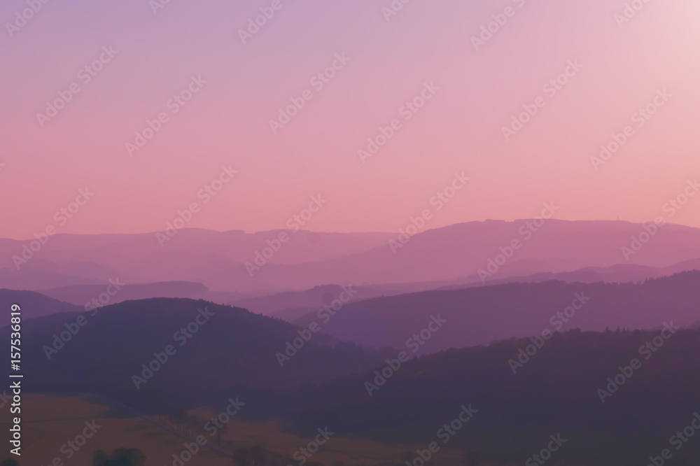 Naklejka premium Early scarlet dawn in the mountains