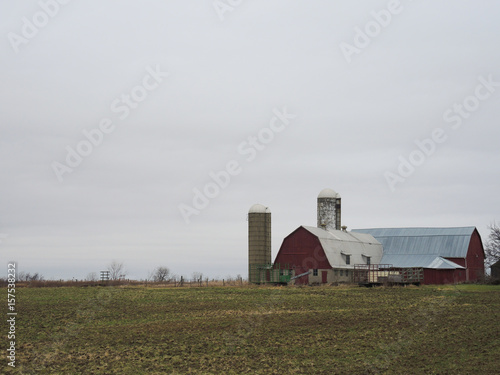 Barn on farm with field