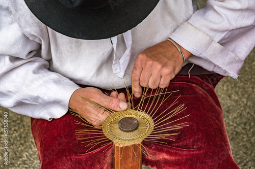 Traditional tinker (Drotar) making a bowl from wire - Folk art