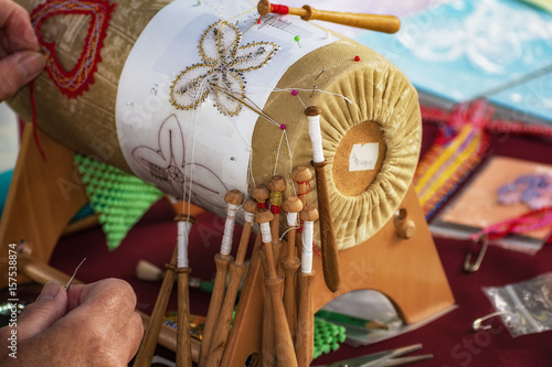 A woman makes bobbin lacing (Palickovanie) - Folk art