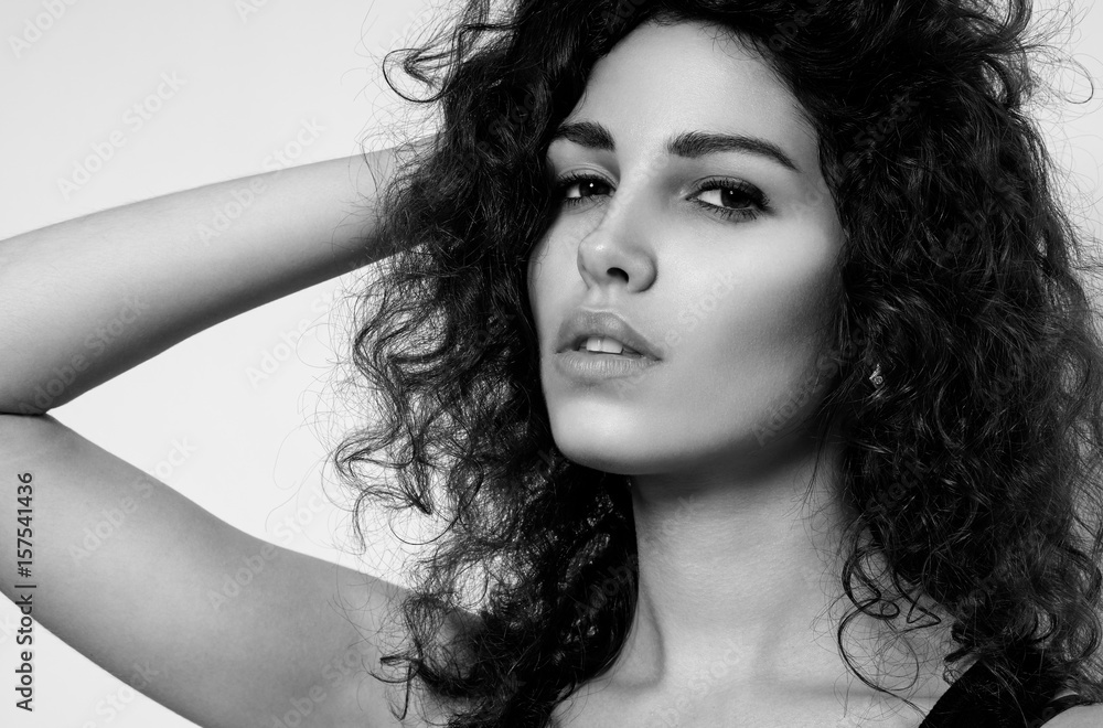 Naklejka premium Young woman with curly hair