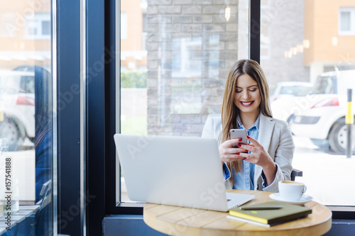 Beautiful Young Woman Texting on Phone Free Download Beautiful Young Woman Texting on Phone - GFXLoad