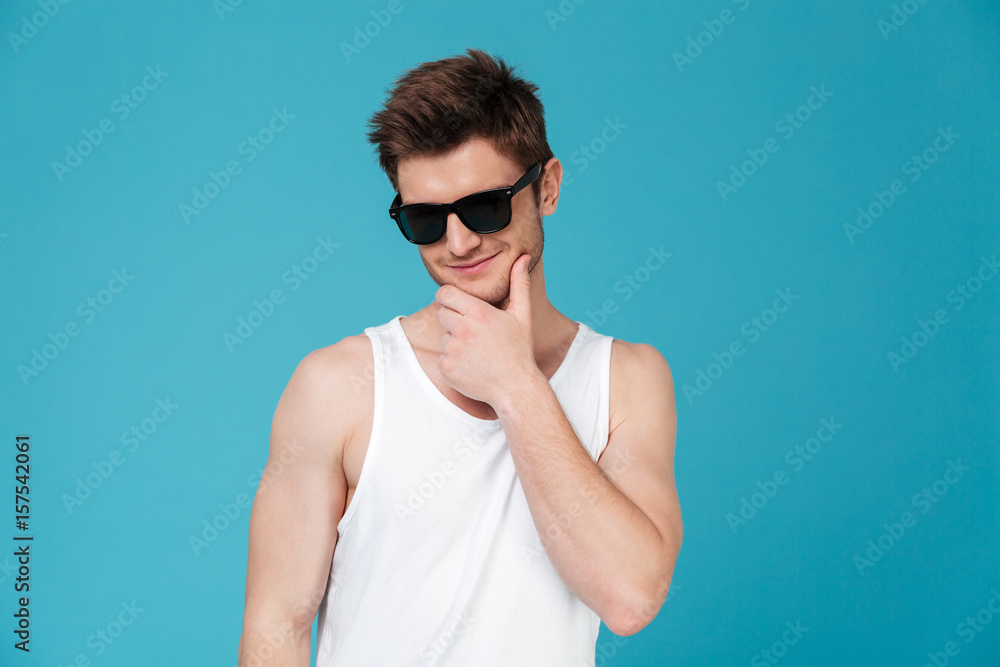 Portrait of a smiling thoughtful man in sunglasses Portrait of a smiling thoughtful man in sunglasses