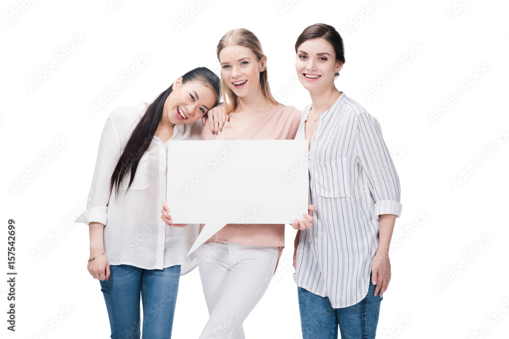 young smiling girls holding blank speech bubble isolated on white young smiling girls holding blank speech bubble isolated on white