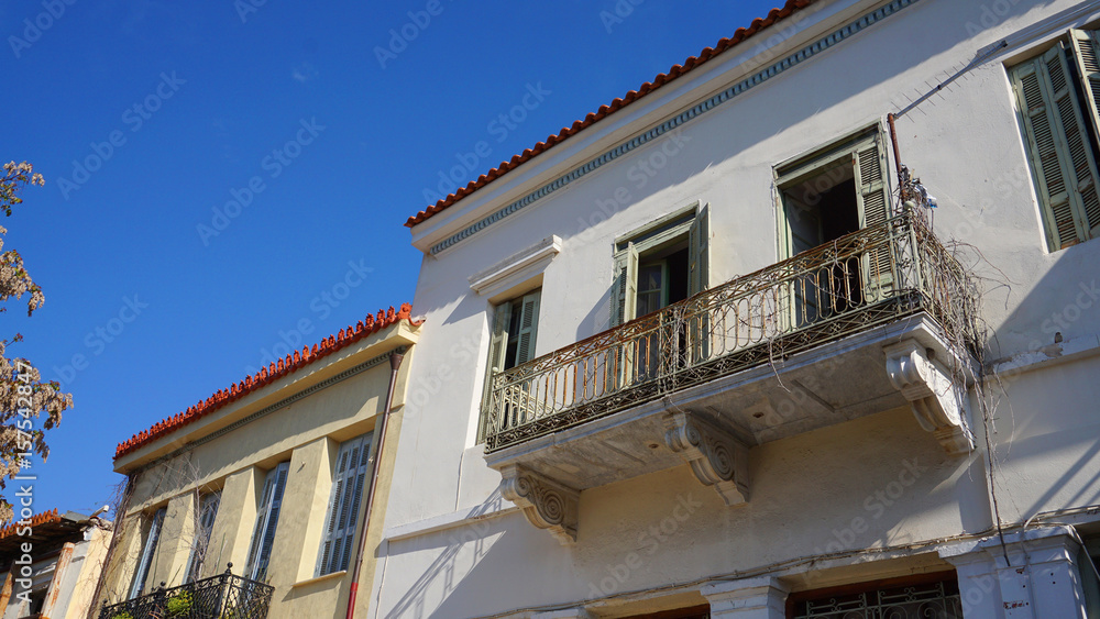 Photo from picturesque Plaka area in center of Athens and Roman Forum archaeological site, Attica, Greece Photo from picturesque Plaka area in center of Athens and Roman Forum archaeological site, Attica, Greece