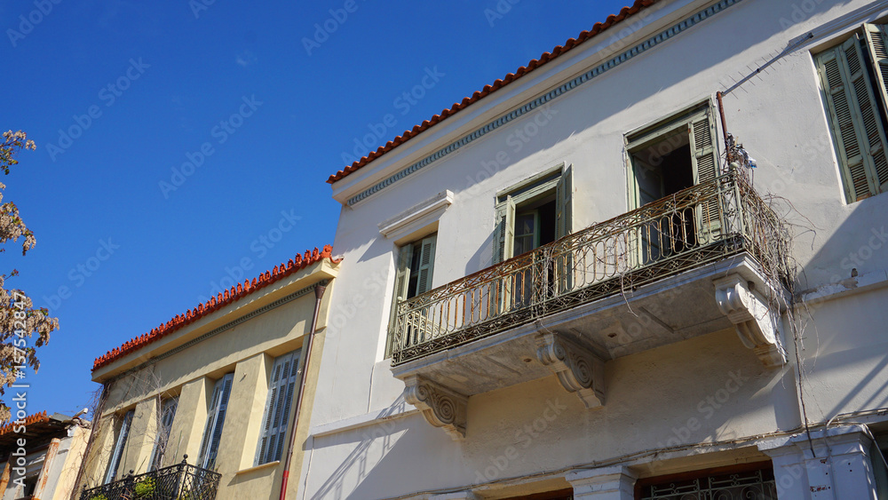 Photo from picturesque Plaka area in center of Athens and Roman Forum archaeological site, Attica, Greece