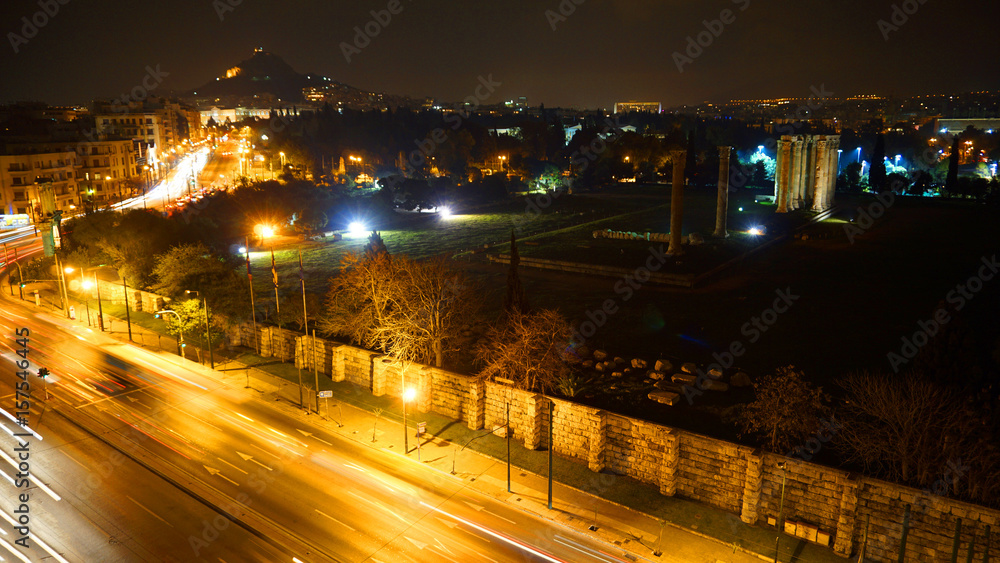 Night photo of Acropolis, Lycabettus and Pillars of Olympian Zeus, Athens historic center, Attica, Greece