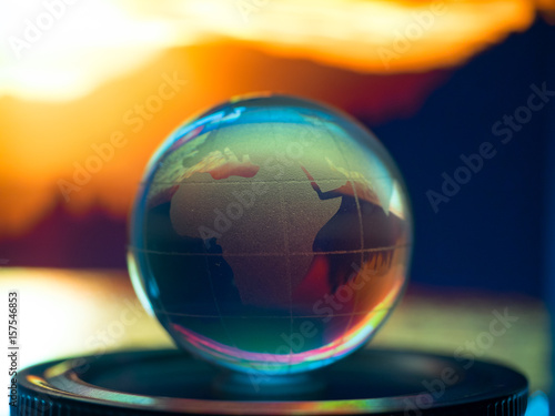 Abstract transparent world ball on colorful background © teerawutbunsom