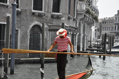 Schilderij op canvas Gondoliere in Venedig
