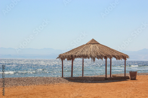 Cottage in a Camp in Sinai, Taba desert with the Background of the Sea and Mountains. © bassemadel