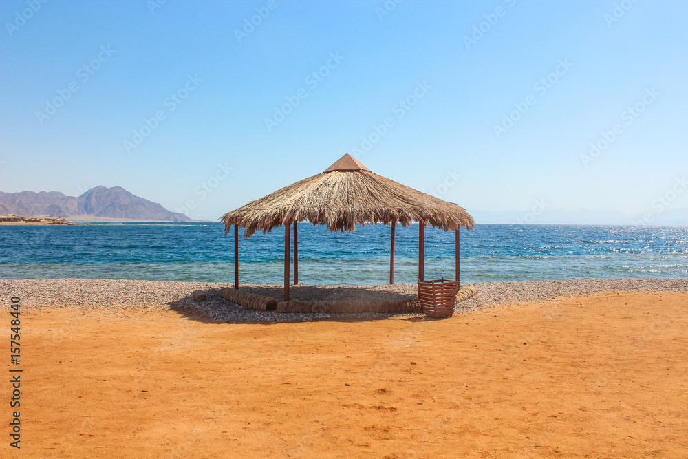 Cottage in a Camp in Sinai, Taba desert with the Background of the Sea and Mountains.