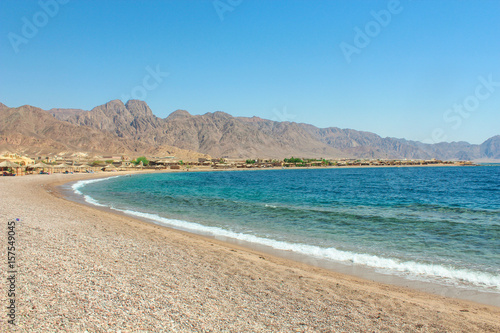 Cottage in a Camp in Sinai  Taba desert with the Background of the Sea and Mountains.