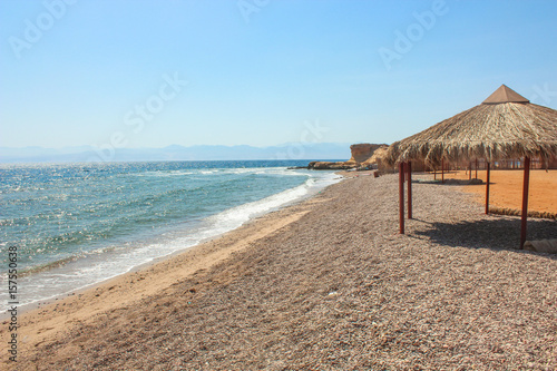 Cottage in a Camp in Sinai  Taba desert with the Background of the Sea and Mountains.